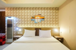 Cozy 1BR Apartment with Workspace at Mustika Golf Residence By Travelio